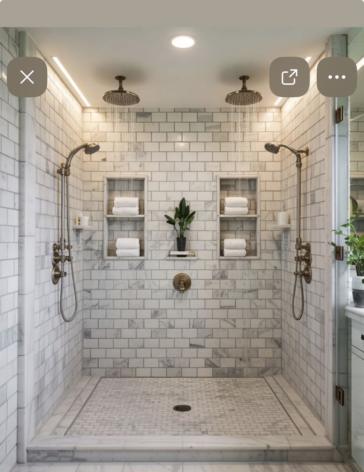 Double rainfall shower with marble subway tile