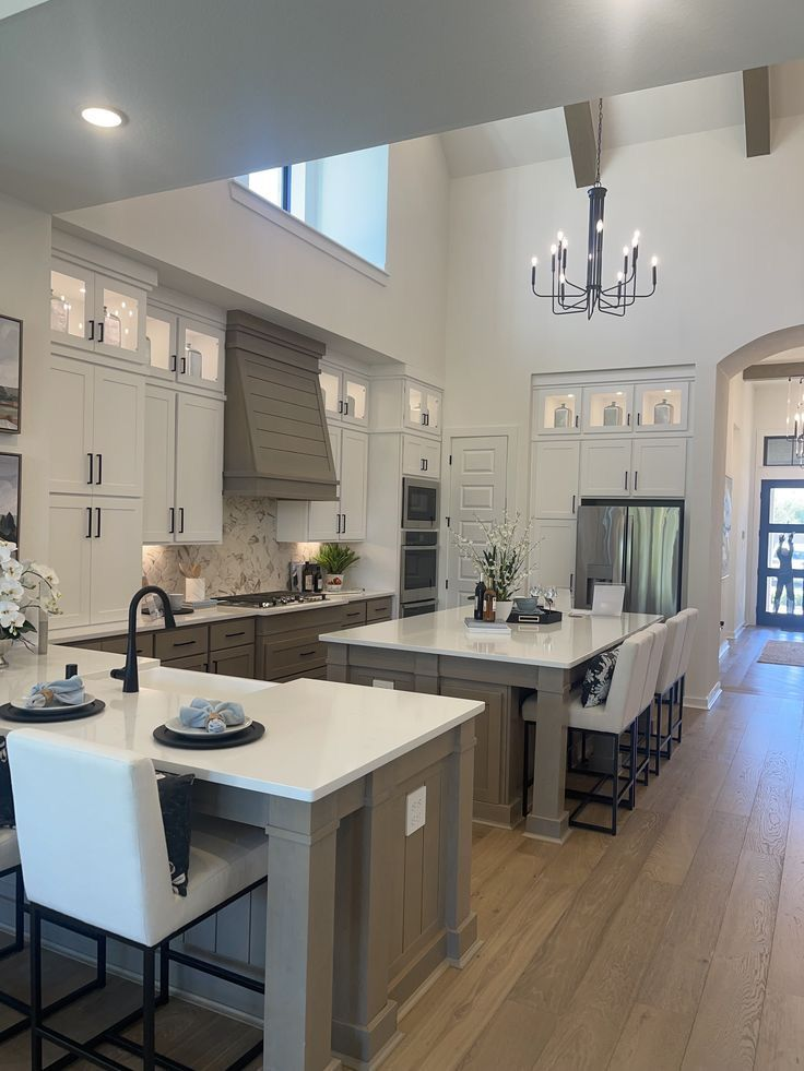 Two-tone kitchen with taupe lowers and white uppers